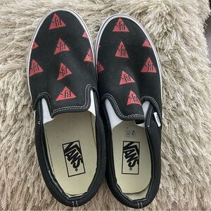 Vans Black and Red Graphic Slip-On Sneakers